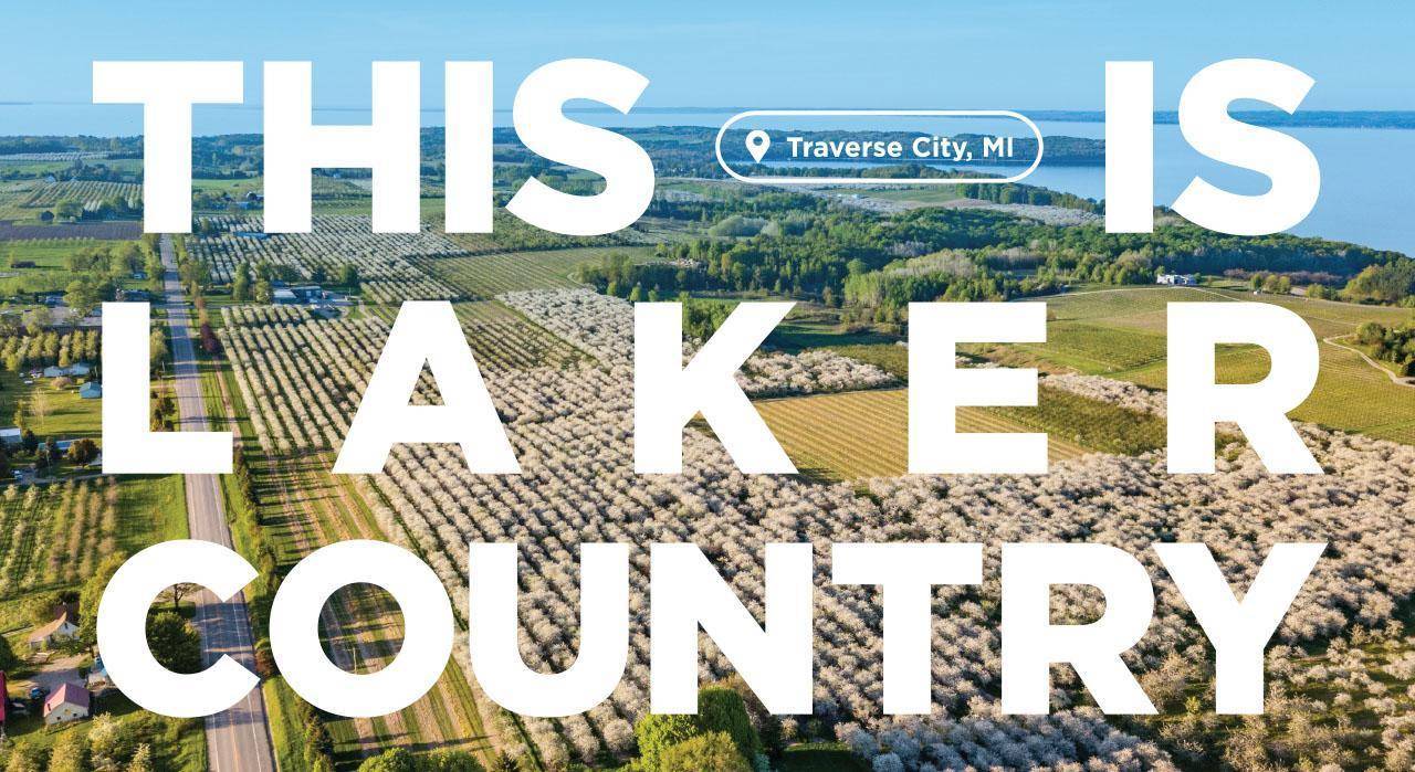 THIS IS LAKER COUNTRY written out over a photo of vineyards in Traverse City